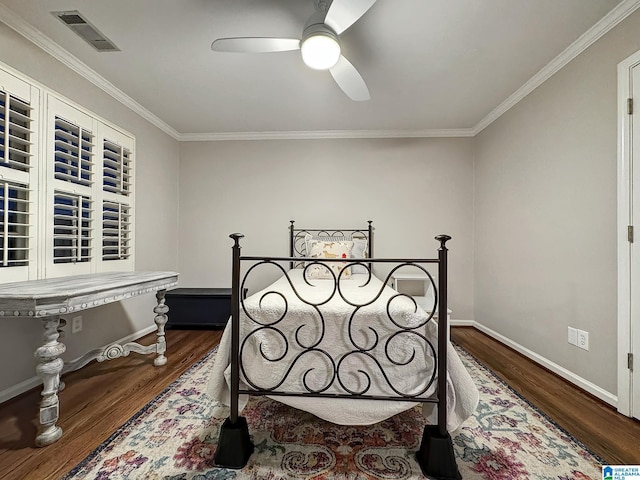 1851 Russet Woods Ln, Hoover, AL 35244 - bedroom featuring wood finished floors, ornamental molding, baseboards, and a ceiling fan