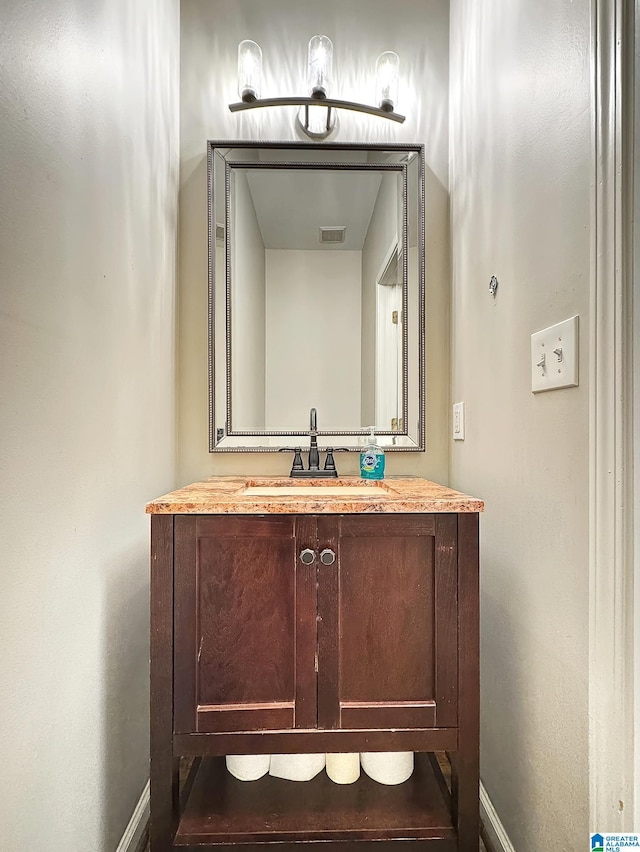 1851 Russet Woods Ln, Hoover, AL 35244 - bathroom featuring baseboards and vanity