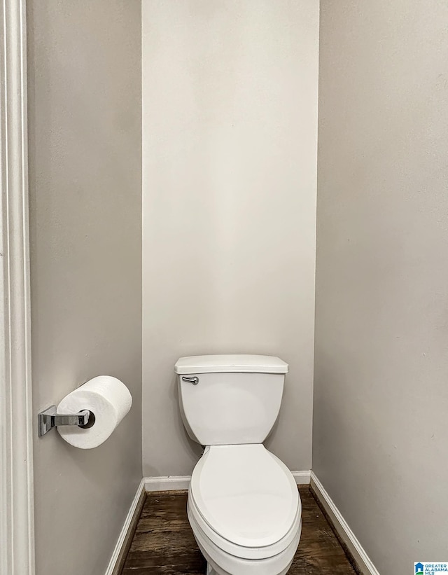 1851 Russet Woods Ln, Hoover, AL 35244 - bathroom featuring wood finished floors, baseboards, and toilet