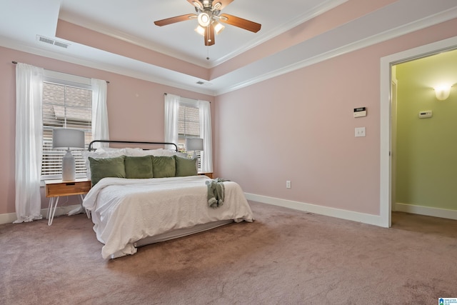 142 Falling Waters Ln, Maylene, AL 35114 - carpeted bedroom with ornamental molding, a raised ceiling, baseboards, and a ceiling fan