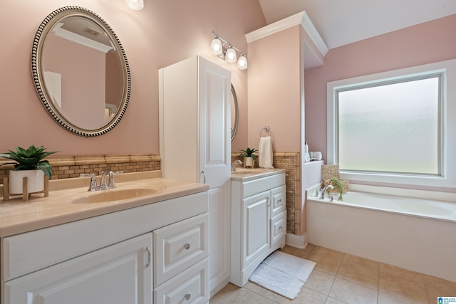 142 Falling Waters Ln, Maylene, AL 35114 - full bath with two vanities, backsplash, tile patterned flooring, and a garden tub