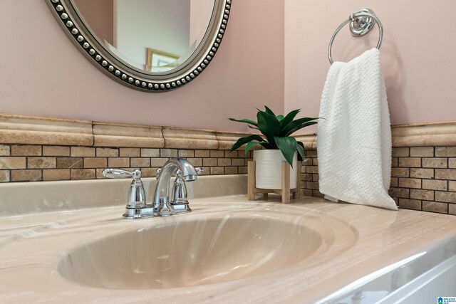 142 Falling Waters Ln, Maylene, AL 35114 - bathroom view of tasteful backsplash and vanity