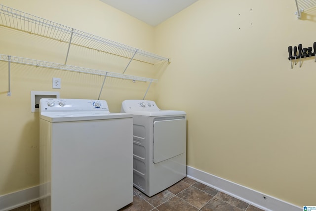142 Falling Waters Ln, Maylene, AL 35114 - laundry area featuring independent washer and dryer and baseboards