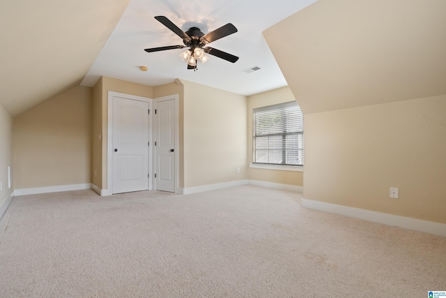 142 Falling Waters Ln, Maylene, AL 35114 - additional living space featuring light colored carpet, vaulted ceiling, baseboards, and a ceiling fan