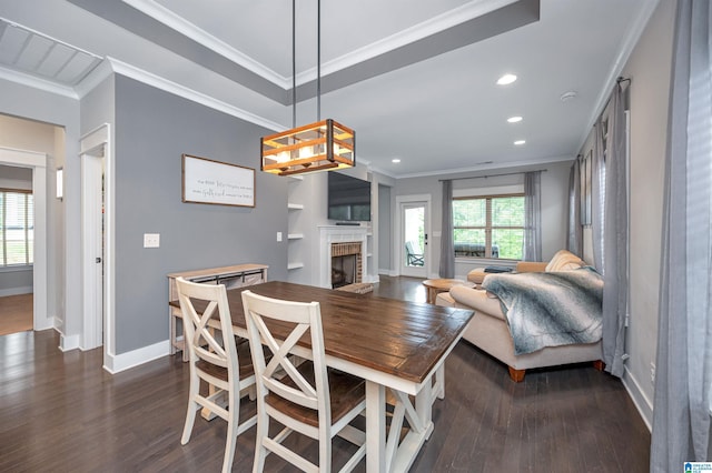 3951 Crest Lndg, Irondale, AL 35210 - dining area featuring dark wood-style flooring, baseboards, ornamental molding, a brick fireplace, and recessed lighting