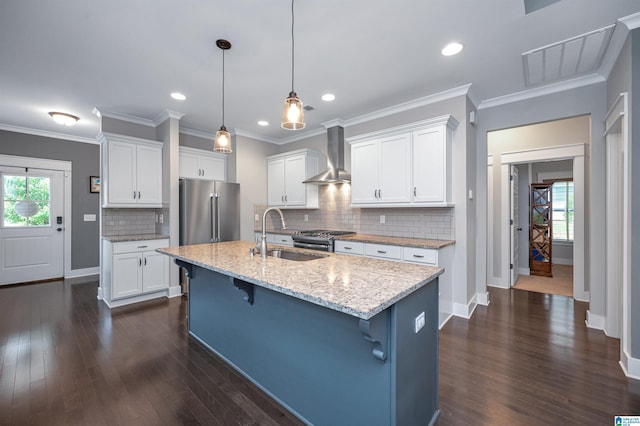3951 Crest Lndg, Irondale, AL 35210 - kitchen featuring a sink, wall chimney range hood, stainless steel appliances, healthy amount of natural light, and recessed lighting