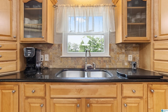 14 Shades Crest Rd, Hoover, AL 35226 - kitchen featuring a sink, tasteful backsplash, glass insert cabinets, and dark stone countertops