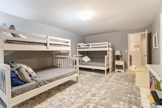 14 Shades Crest Rd, Hoover, AL 35226 - bedroom featuring a textured ceiling and carpet flooring