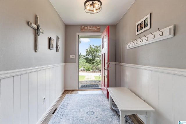 14 Shades Crest Rd, Hoover, AL 35226 - mudroom featuring a wainscoted wall and wood finished floors