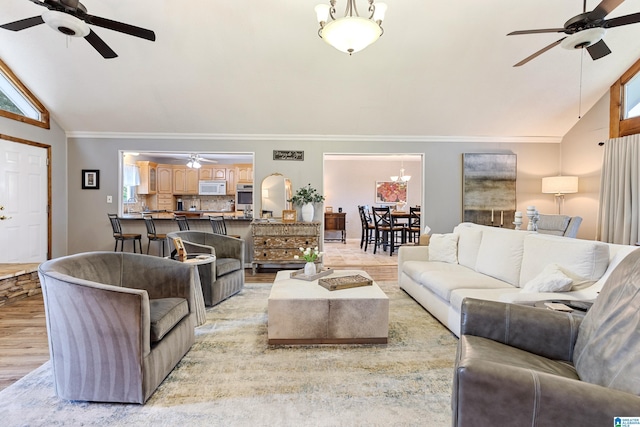 14 Shades Crest Rd, Hoover, AL 35226 - living room featuring ceiling fan, lofted ceiling, crown molding, and light wood finished floors
