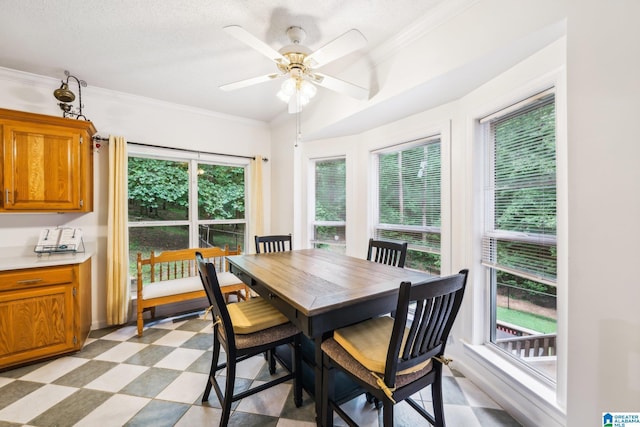 8526 Scenic Ridge Dr, Pinson, AL 35126 - dining space featuring light floors, ceiling fan, and crown molding