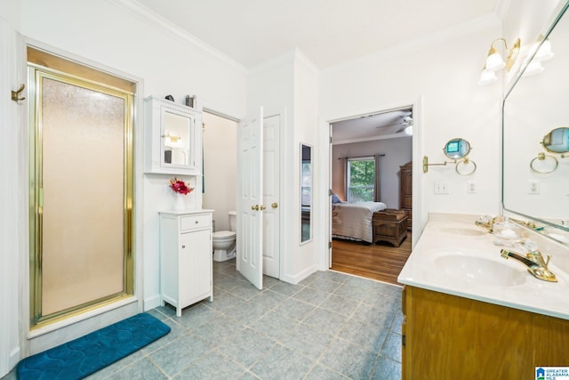 8526 Scenic Ridge Dr, Pinson, AL 35126 - ensuite bathroom with ornamental molding, a stall shower, double vanity, toilet, and ceiling fan