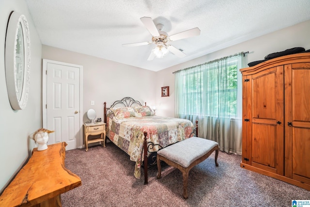 8526 Scenic Ridge Dr, Pinson, AL 35126 - bedroom with carpet floors, a ceiling fan, and a textured ceiling
