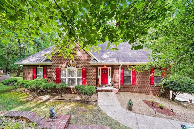 8526 Scenic Ridge Dr, Pinson, AL 35126 - view of front of house with a shingled roof and brick siding