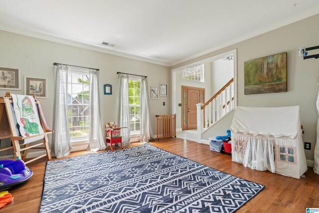 1051 Oak Meadows Rd, Birmingham, AL 35242 - entryway with crown molding, wood finished floors, stairway, and baseboards