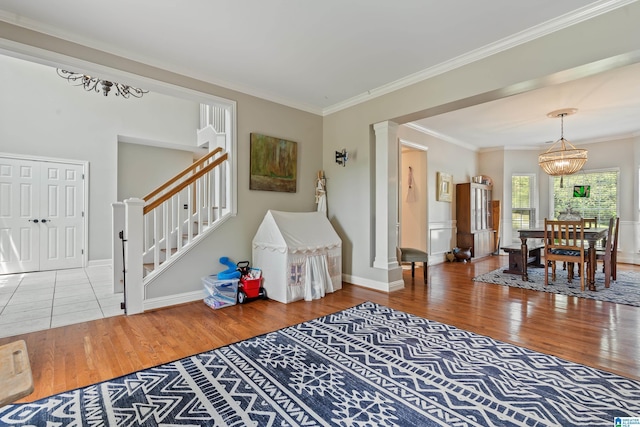 1051 Oak Meadows Rd, Birmingham, AL 35242 - foyer featuring wood finished floors, stairs, ornamental molding, baseboards, and a chandelier