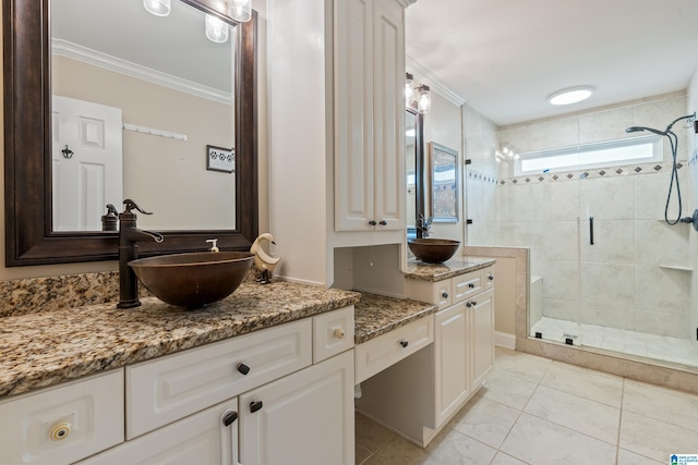 1051 Oak Meadows Rd, Birmingham, AL 35242 - full bathroom with crown molding, a stall shower, tile patterned flooring, and two vanities
