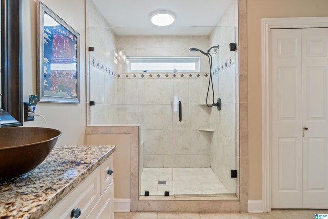 1051 Oak Meadows Rd, Birmingham, AL 35242 - full bathroom featuring a stall shower, vanity, and a closet