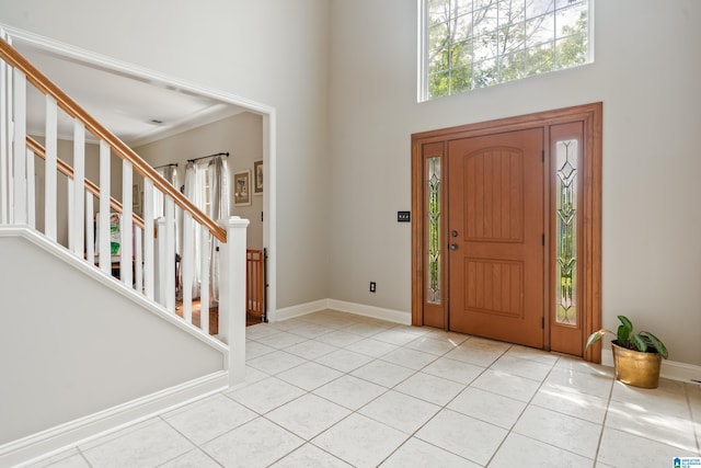 1051 Oak Meadows Rd, Birmingham, AL 35242 - tiled entrance foyer featuring a high ceiling, baseboards, and stairs
