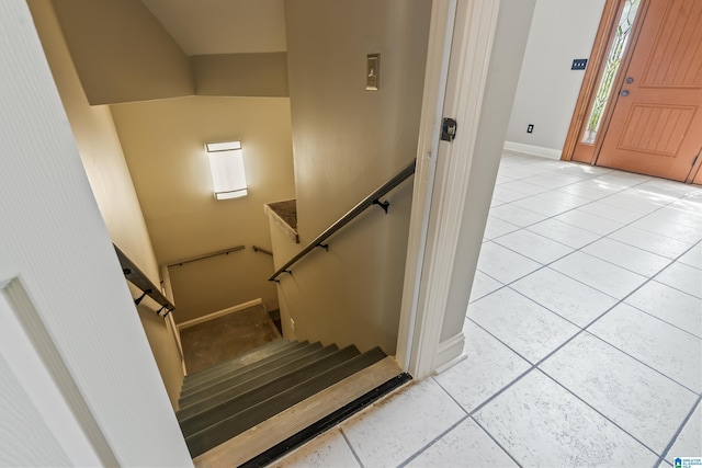 1051 Oak Meadows Rd, Birmingham, AL 35242 - stairway with tile patterned floors and baseboards