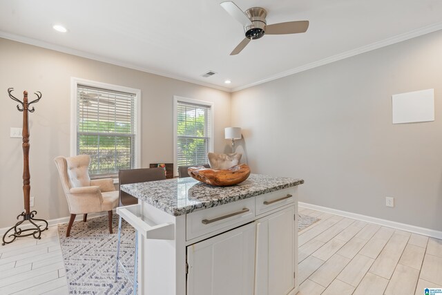 1051 Oak Meadows Rd, Birmingham, AL 35242 - kitchen featuring ornamental molding, light wood-type flooring, a ceiling fan, white cabinets, and baseboards