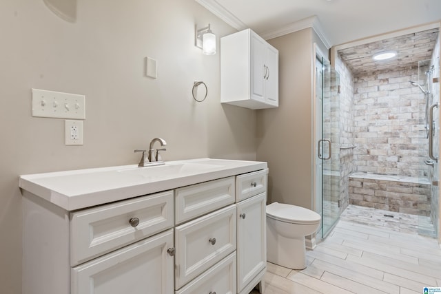 1051 Oak Meadows Rd, Birmingham, AL 35242 - bathroom featuring a shower stall, toilet, ornamental molding, vanity, and wood finish floors