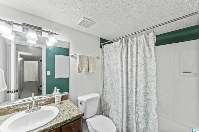 505 Patton Chapel Way Unit 505, Hoover, AL 35226 - full bath with a textured ceiling, vanity, toilet, curtained shower, and a textured wall