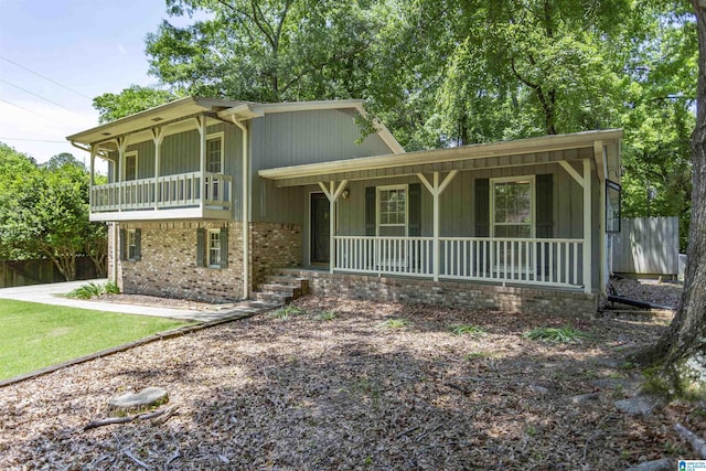 4734 Chablis Way, Birmingham, AL 35244 - view of front of property with covered porch, fence, brick siding, and a balcony