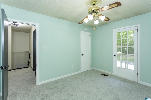 4734 Chablis Way, Birmingham, AL 35244 - empty room with carpet flooring, baseboards, ceiling fan, and a textured ceiling