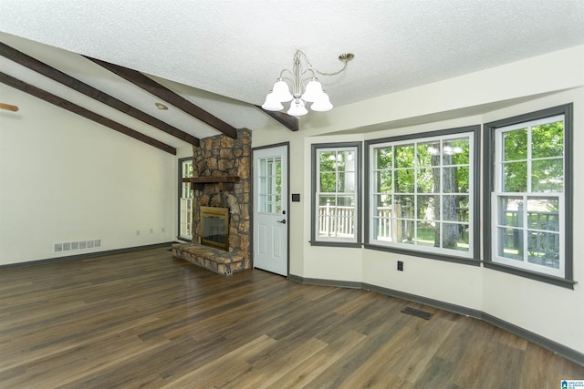 4734 Chablis Way, Birmingham, AL 35244 - unfurnished living room featuring a chandelier, wood finished floors, a fireplace, a textured ceiling, and baseboards