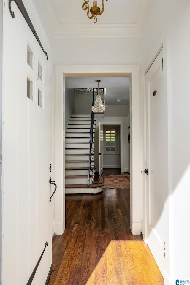 2520 Lanark Rd, Birmingham, AL 35223 - foyer entrance featuring wood finished floors, crown molding, stairway, and baseboards