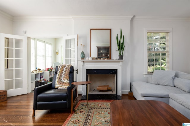 2520 Lanark Rd, Birmingham, AL 35223 - living room featuring crown molding, wood finished floors, and a fireplace with flush hearth