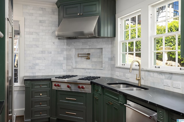 2520 Lanark Rd, Birmingham, AL 35223 - kitchen featuring a sink, under cabinet range hood, stainless steel appliances, backsplash, and dark stone countertops