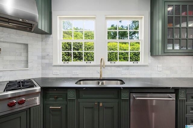 2520 Lanark Rd, Birmingham, AL 35223 - kitchen with a sink, exhaust hood, appliances with stainless steel finishes, tasteful backsplash, and healthy amount of natural light