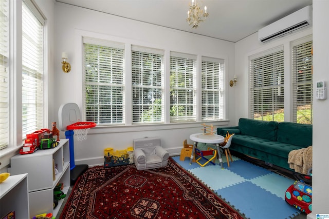 2520 Lanark Rd, Birmingham, AL 35223 - sunroom featuring an AC wall unit, plenty of natural light, and a chandelier