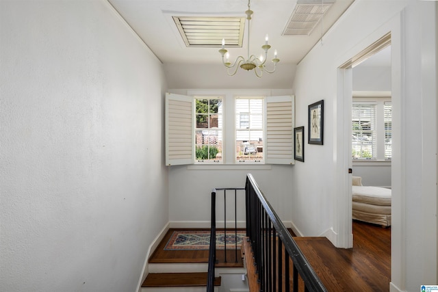2520 Lanark Rd, Birmingham, AL 35223 - hall with a chandelier, baseboards, an upstairs landing, and wood finished floors