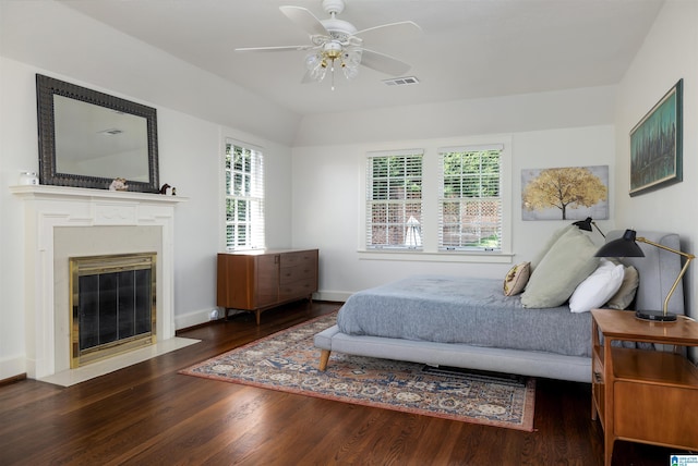 2520 Lanark Rd, Birmingham, AL 35223 - bedroom featuring wood finished floors, a fireplace with flush hearth, baseboards, and ceiling fan