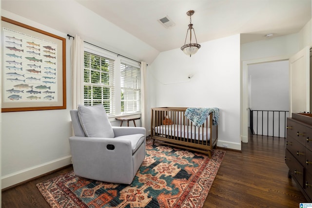 2520 Lanark Rd, Birmingham, AL 35223 - bedroom with wood finished floors, baseboards, lofted ceiling, and a nursery area