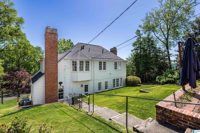 2520 Lanark Rd, Birmingham, AL 35223 - rear view of property with a chimney