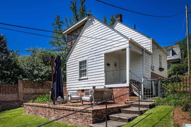 2520 Lanark Rd, Birmingham, AL 35223 - view of front of home featuring a chimney and a patio area