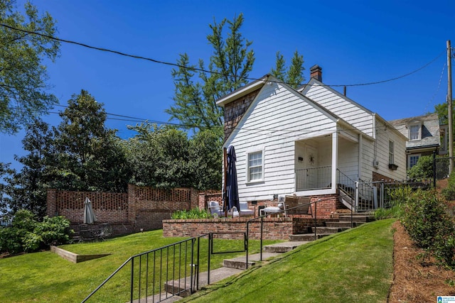 2520 Lanark Rd, Birmingham, AL 35223 - view of front facade with a chimney