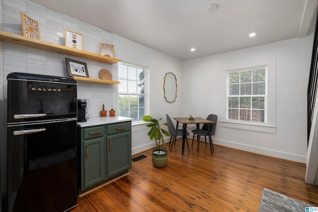2520 Lanark Rd, Birmingham, AL 35223 - kitchen with freestanding refrigerator, healthy amount of natural light, open shelves, tasteful backsplash, and recessed lighting