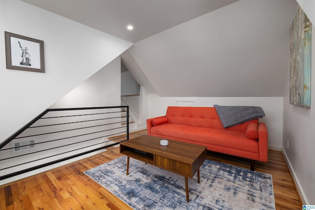2520 Lanark Rd, Birmingham, AL 35223 - living room with wood finished floors, baseboards, recessed lighting, and lofted ceiling