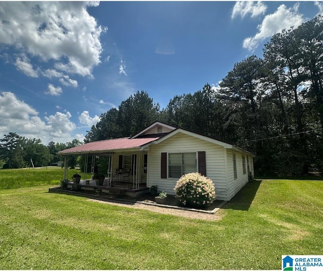 1619 Websters Chapel Rd, Wellington, AL 36279 - view of front facade with a front lawn and metal roof