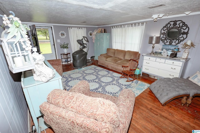 1619 Websters Chapel Rd, Wellington, AL 36279 - living area with wood finished floors, a textured ceiling, and ornamental molding