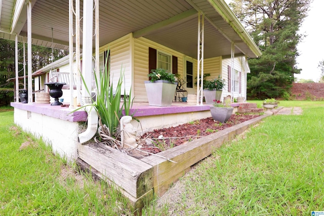 1619 Websters Chapel Rd, Wellington, AL 36279 - doorway to property featuring covered porch and a lawn