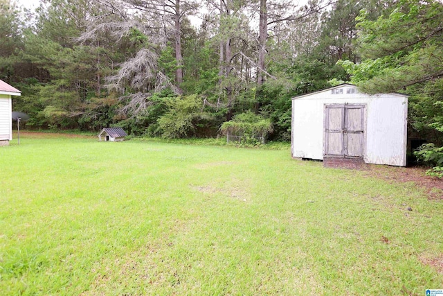 1619 Websters Chapel Rd, Wellington, AL 36279 - view of green lawn with a shed and an outbuilding