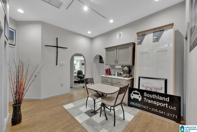 4150 County Highway 13, Locust Fork, AL 35097 - dining area with arched walkways, light wood finished floors, recessed lighting, baseboards, and track lighting