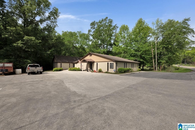 4150 County Highway 13, Locust Fork, AL 35097 - ranch-style home featuring view of wooded area
