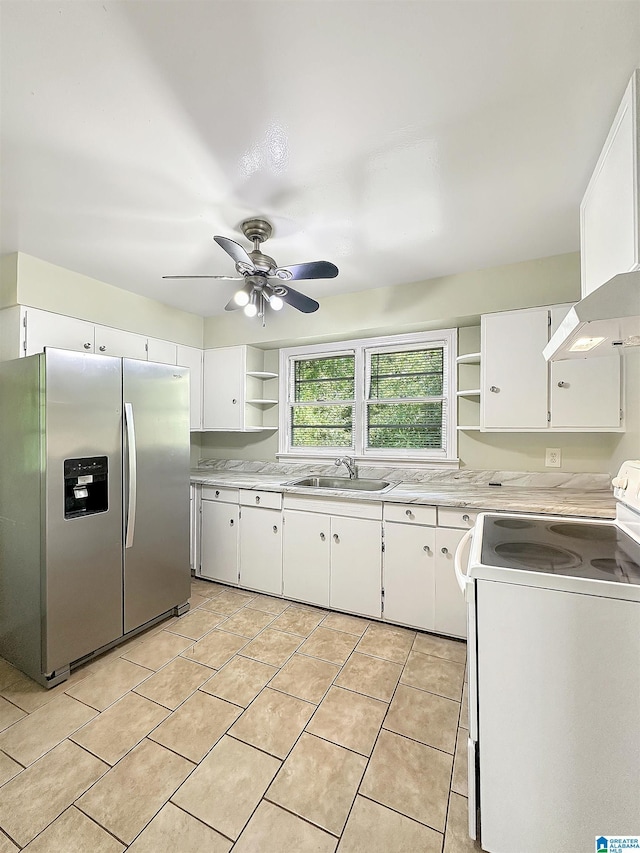 kitchen featuring electric range, stainless steel refrigerator with ice dispenser, open shelves, and a sink
